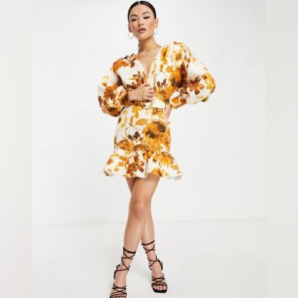 ASOS DESIGN plunge pephem belted mini dress in yellow floral print
